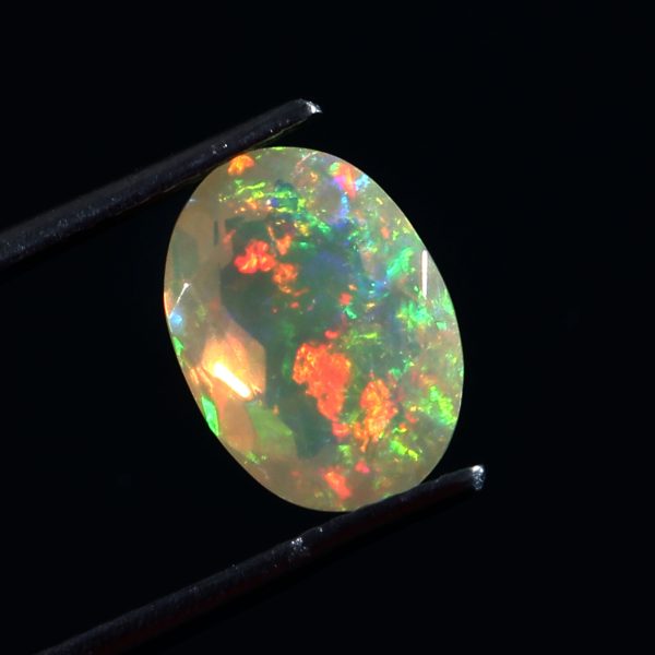 1.7 cts Natural ethiopian opal faceted yellow gemstone oval shape - 407
