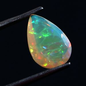 1.25 Cts Natural ethiopian gemstone faceted pear yellow opal - 402
