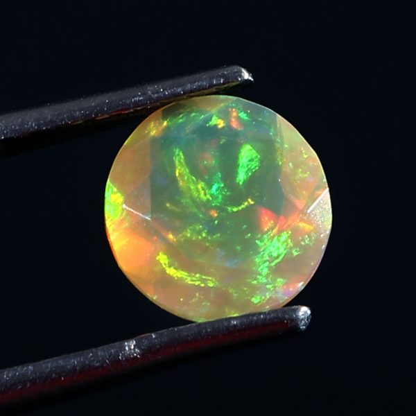 0.8 Cts Natural ethiopian opal faceted yellow gemstone round shape - 424