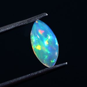 0.8 Cts Natural ethiopian opal smooth white gemstone marquise shape - 425