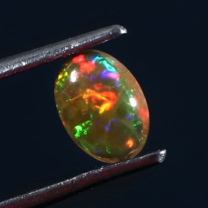 0.5 Cts Natural ethiopian opal smooth yellow gemstone oval shape - 428