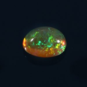 0.8 cts Natural ethiopian opal smooth yellow gemstone oval shape - 384