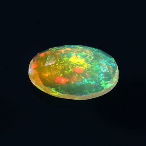 1.6 cts Natural ethiopian opal faceted yellow gemstone oval shape - 408